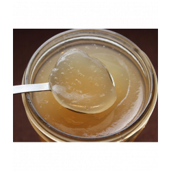 Imagen del frasco abierto con una cuchara